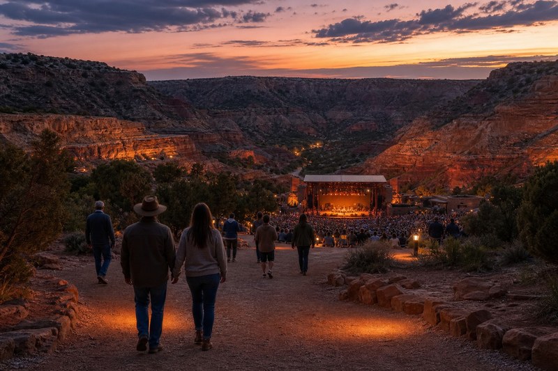 Pioneer Amphitheatre glowing at dusk inside Palo Duro Canyon