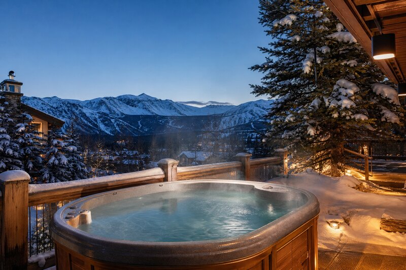 Outdoor hot tub at a snowy Breckenridge lodge