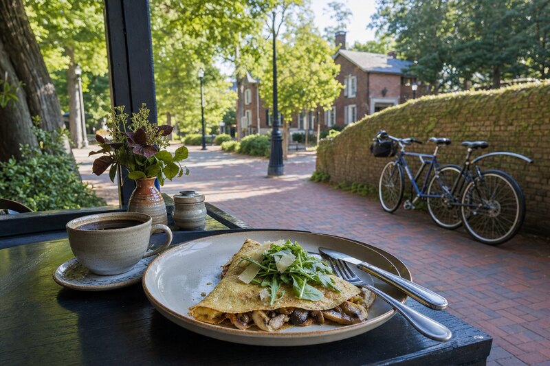 Coffee and a savory crepe on a foothills-town patio