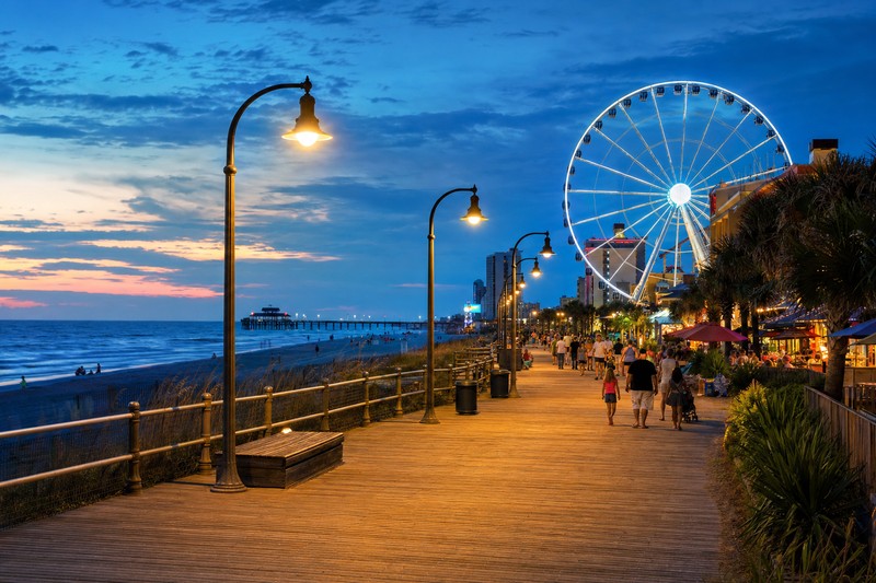 Myrtle Beach Boardwalk and oceanfront lights at dusk
