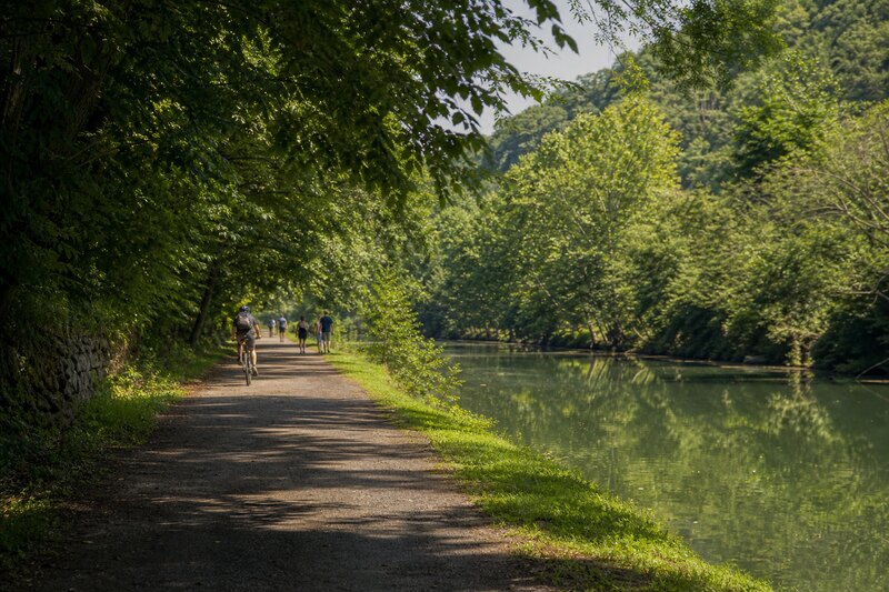 Walk the canal before downtown gets loud