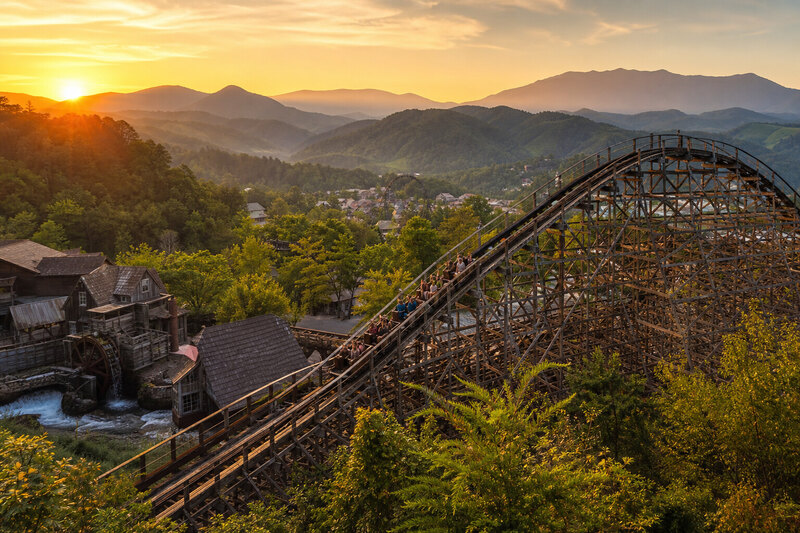 Theme park coaster with Smoky Mountain backdrop near Pigeon Forge