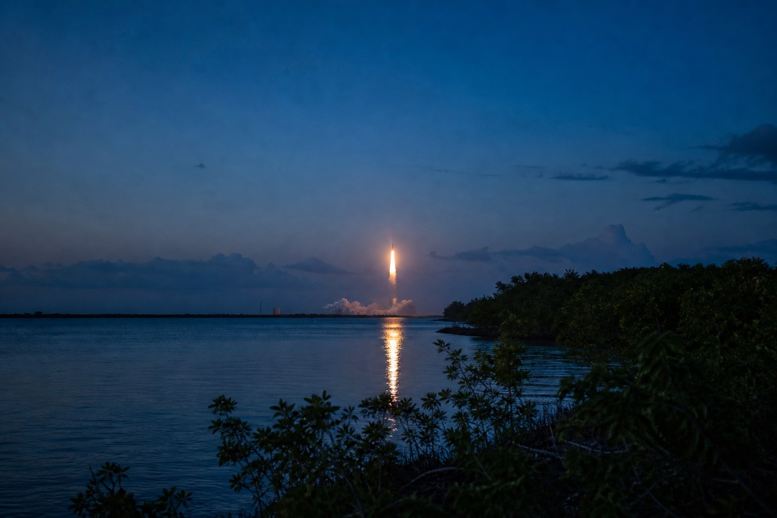 Rocket launch seen across the Space Coast at dusk