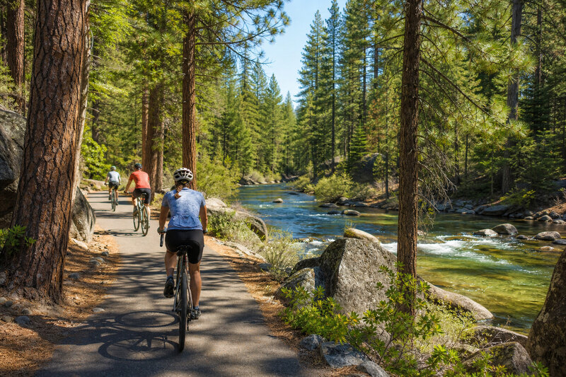Cyclists riding beside the Truckee River near Tahoe City