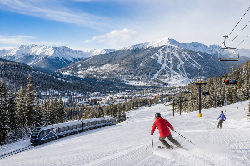 Snowy Winter Park ski slopes with mountain views