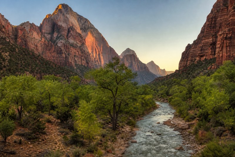 Zion Canyon red cliffs and the Virgin River at warm morning light